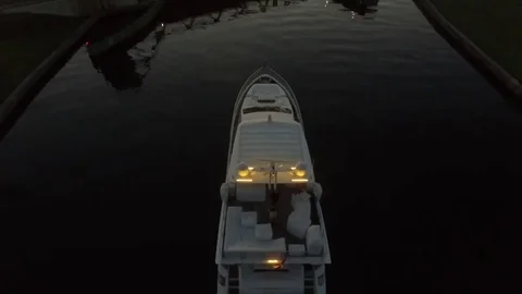 Yacht Going through draw bridge at sunrise Stock Footage 81257440