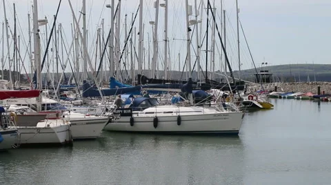 Yacht moving into is berth Stock Footage 51256085