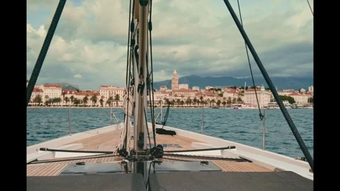 Yacht Nears Split, Mooring Vessel Against Moody Cloudy Sky. Stock Footage 323549024