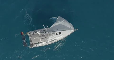 Yacht with reflection sailing on open sea aerial. Nobody nature seascape with Vídeo Stock 151377265