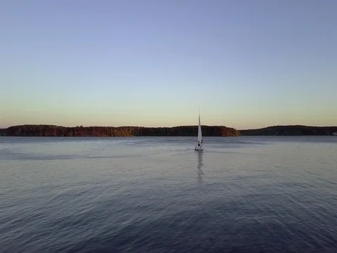 Yacht sailing on the river. Stock Footage 76364854