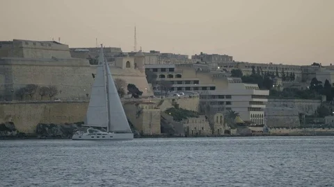 Yacht Sailing by the shore Stock Footage 74801884