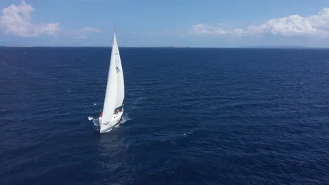 Yacht sailing at sunset during a storm. Luxury vacation at sea 스톡 동영상 134455465