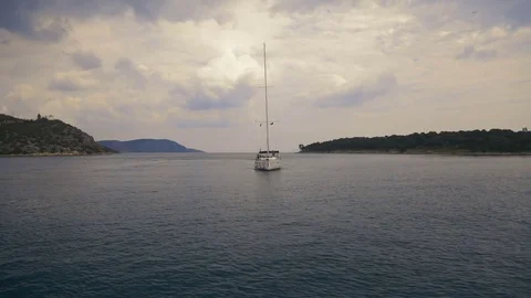 Yacht sails in the harbor Stock Footage 74095383