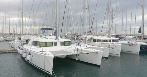 Yachts and catamarans in marina Stock Footage 74109448