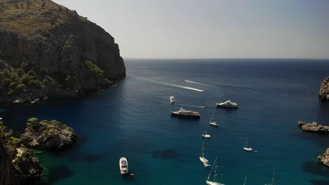 Yachts in the bay between the rocks. Summertime Stock Footage 112070863