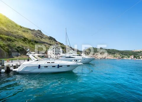 Yachts in the bay Stock Photos