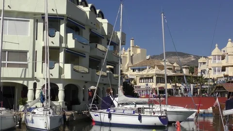Yachts boats deep blue sky harbour Stock Footage 74710255