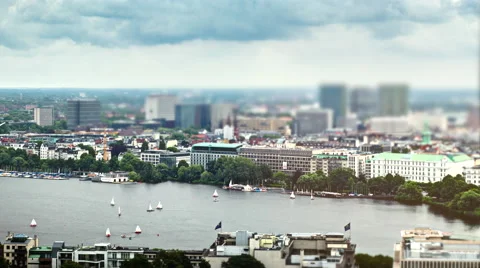 Yachts float down Alster river Hamburg Germany sunny blur timelapse Stock Footage 65372740