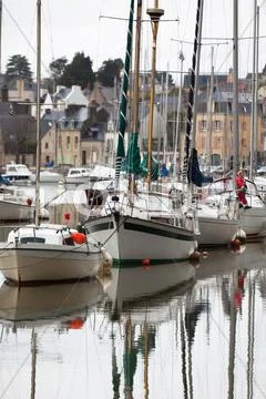 Yachts in harbor of french town Stock Photos