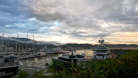 Yachts moored at the port on a cloudy winter day Stock Footage 304547867