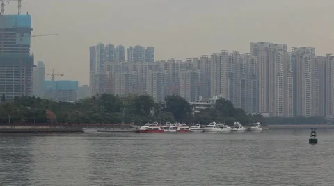 Yachts at the quay and skyscrapers in Guangzhou China Stock-Footage 59134255