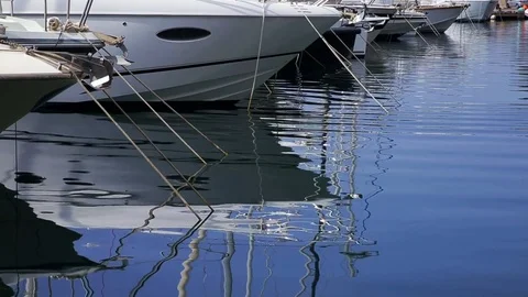 Yachts reflects in ripples water Stock Footage 78566985