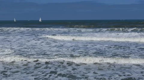 Yachts sailing in far distance Stock Footage 64385235