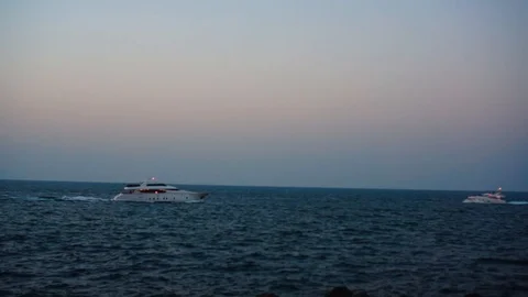 Yachts on the sea at sunset. Stock Footage 86311595