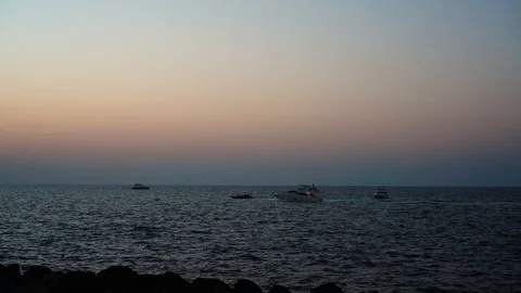 Yachts on the sea at sunset. Stock Footage 86312491