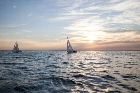 Yachts at sunset Stock Photos