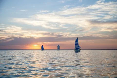 Yachts at sunset Stock Photos