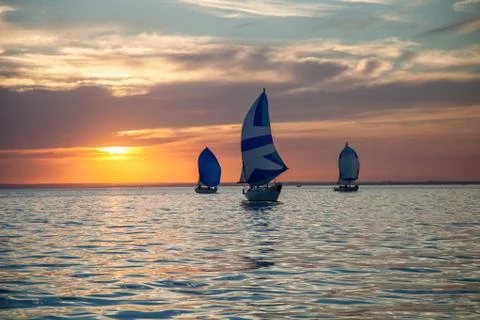Yachts at sunset Stock Photos