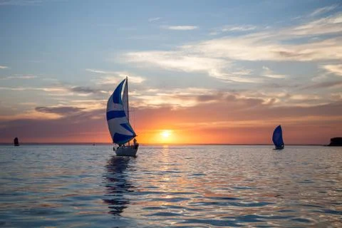 Yachts at sunset Stock Photos