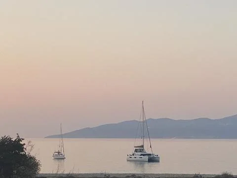 Yachts at sunset Stock Photos