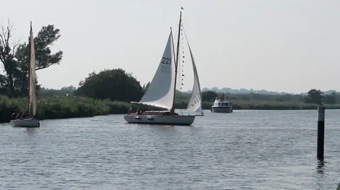 Yachts zig-zagging on the Rive Bure, England. Stock Footage 68092500