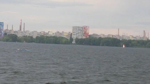 The yachtsman understands the sail on the river after a heavy rain Stock Footage 125299518
