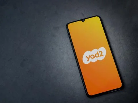 Yad2 app launch screen with logo on the display of a black mobile smartphone  Stock Photos