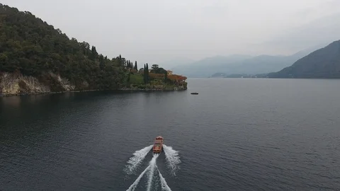 Yaht going to Villa Balbianello, Como Lake, Italy Stock Footage 117634199