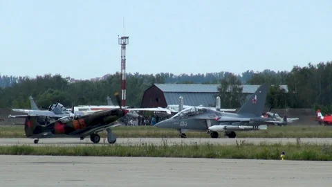 Yak-130 (NATO codification: mittens) - combat trainer drives runway. Stock Footage 120497459