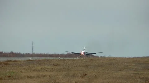 YAK-40 Codling. Plane landing on a runway at a strong lateral wind Video stock 20503848