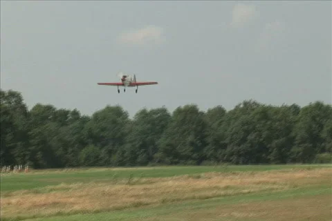 Yak 52 Flies Over Stock Footage 683300