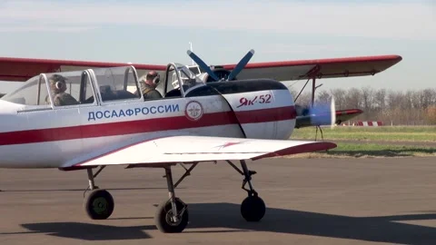 Yak-52 is Soviet two-seat sports trainer. Aeroclub DOSAAF Russia. Krasnodar. Stock Footage 139273475