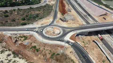 Yanai interchange roundabout under construction Israel AUG12 2022 Aerial shot Stock Footage 293227503