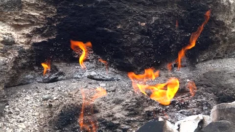 Yanartas methane flames burn through rocky vent - Gas Source and Relief Pattern Stock Footage 339792103