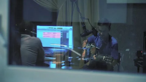 Yang singer recording song in studio Stock Footage 93775798
