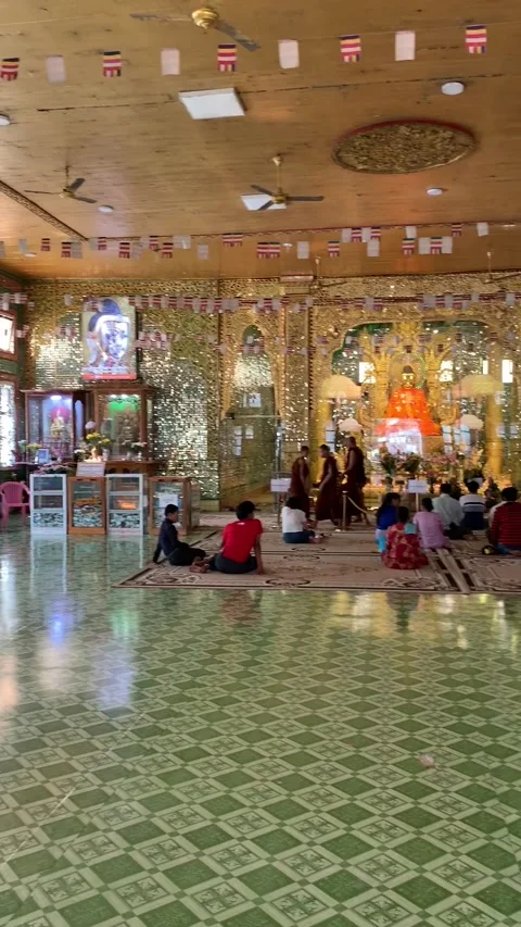 Yangon, Myanmar - 2019/12/02 : Inside a temple Stock Footage 343882161