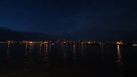 Yangon river by night, city lights in background, Burma, Asia in 4K Stock Footage 93963472