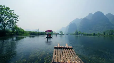 Yangshuo, China - bamboo rafting Stock Footage