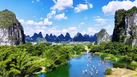Yangshuo Li River Landscape with Karst Mountains and Bamboo Rafts Stock Footage 337720172
