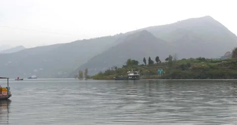 Yangtze River Cargo Ships in Continuous Misty Traffic 4K Stock Footage 320153766