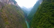 Yangtze River Flowing Through Green Lush Mountain On A Foggy Day Stock Footage