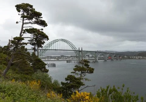 Yaquina Bay Bridge under dramatic storm clouds in Newport Oregon Stock Photos