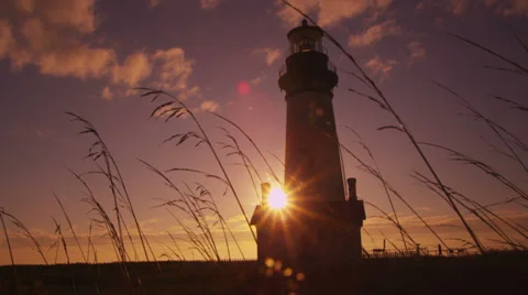 Yaquina Head Lighthouse at sunset Video stock 32735174