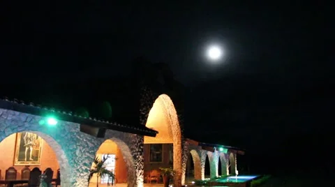 Yard patio night time moon Stock Footage 974827