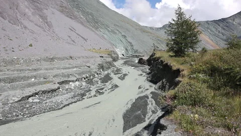 Yarlu River flowing into the gorge, view of the colored mountains , Altai Stock Footage 99334995