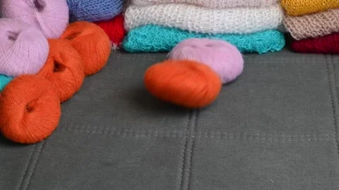 Yarn balls piled together, soft wool texture. Stock Footage 334749436