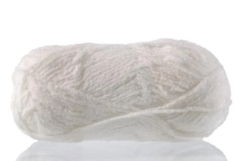 Yarn for handwork and knitting. Set on a white background with reflection. Stock Photos