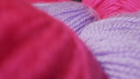 Yarn for knitting. A ball of thread on a black background 動画素材 247278820
