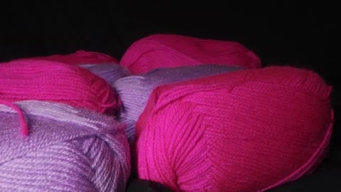 Yarn for knitting. A ball of thread on a black background 動画素材 247279020
